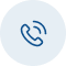 A dark blue line-art icon of a telephone handset with sound waves, set against a light blue circular background. This icon is commonly used to represent a phone call, contact us, or customer support.